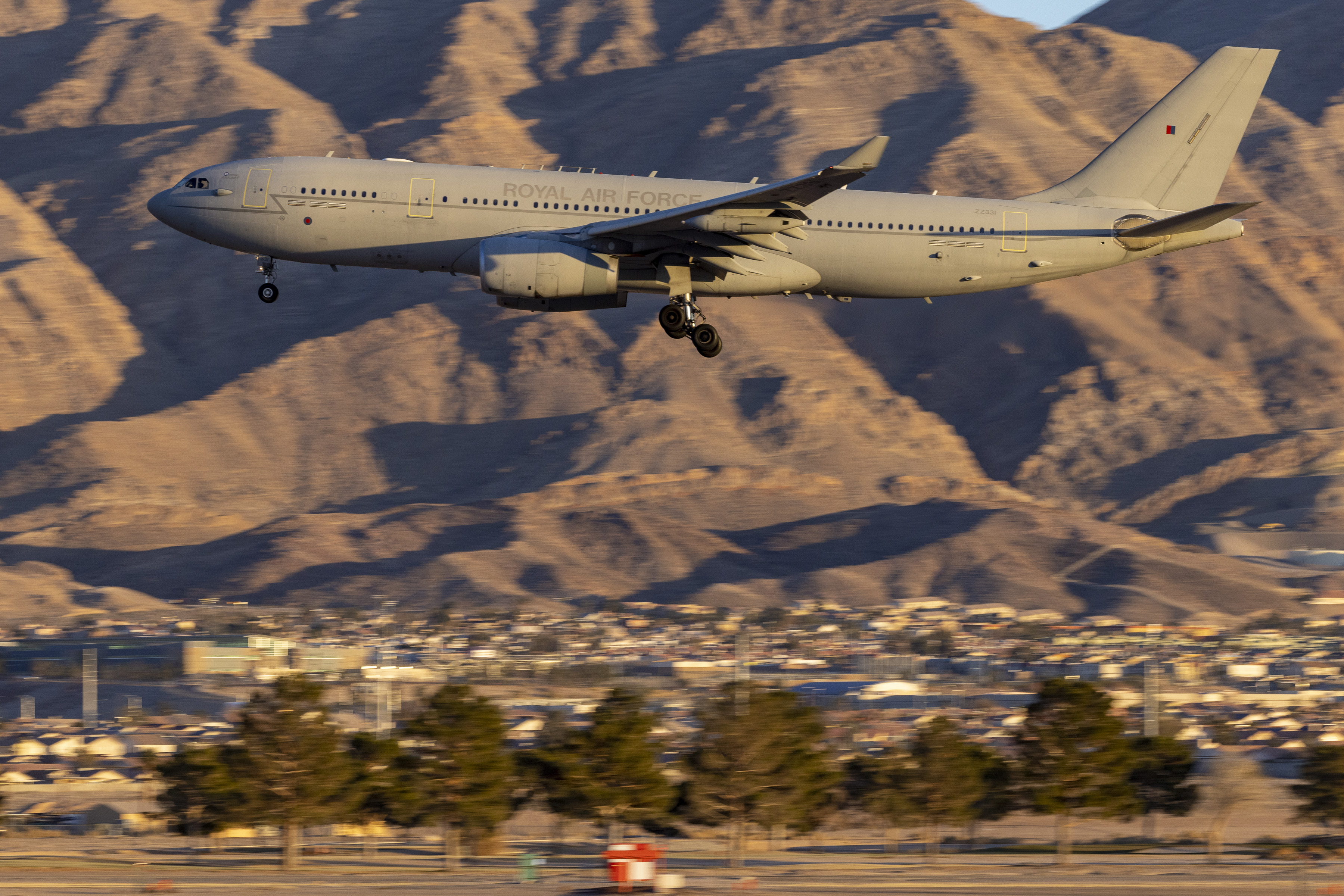 Image shows RAF Rivet Joint aircraft taking off from the airfield.